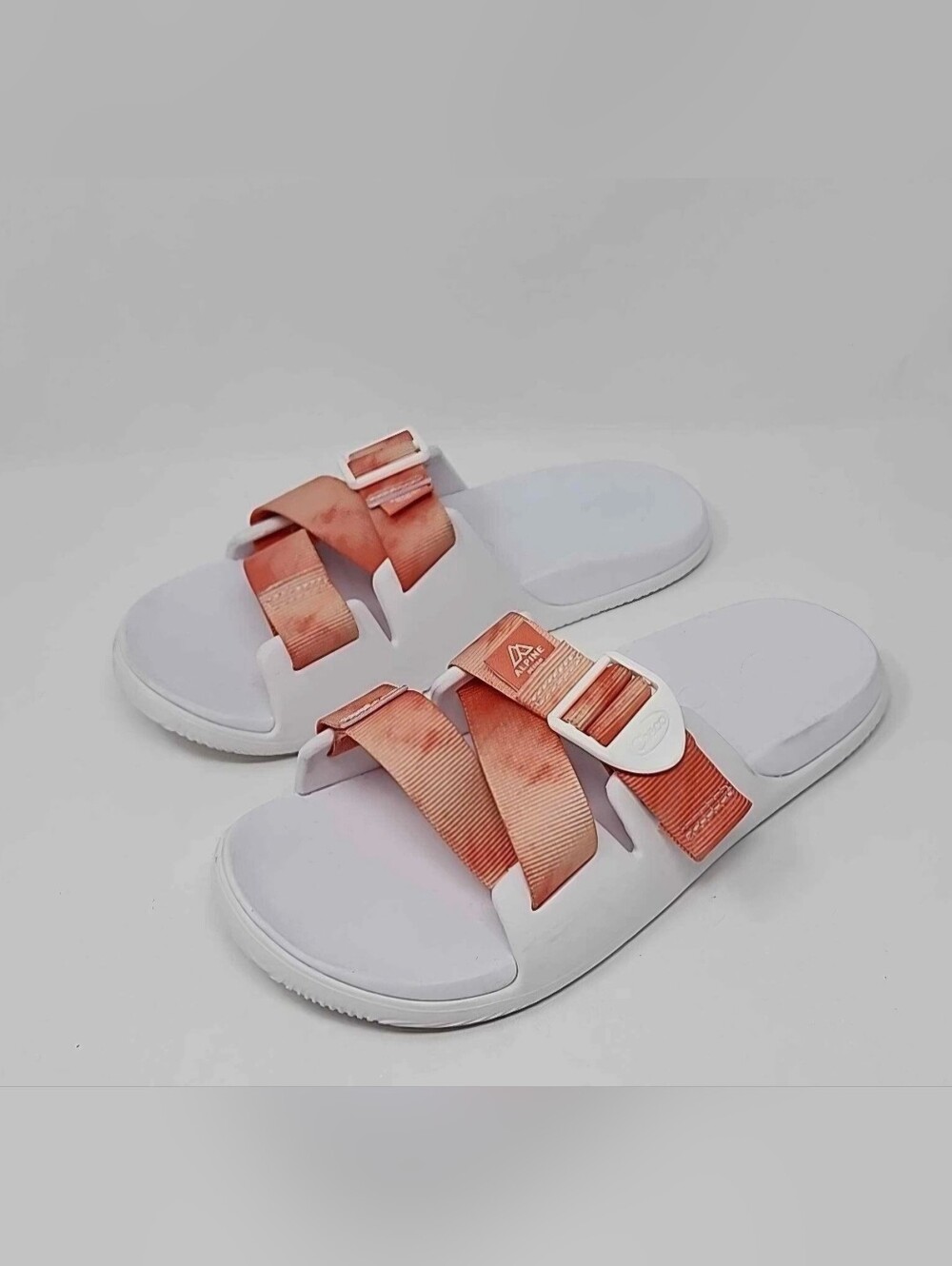 Chaco Women's Chillos Slide Sandals in the "Persimmon" orange and white tie-dye